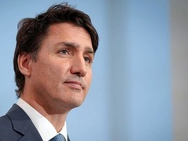 Haïti - Politique : Intervention en Haïti, Le P.M. du Canada temporise
