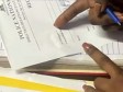 Haiti - Social : Presentation of the first compensation check for police victims on duty (Video)